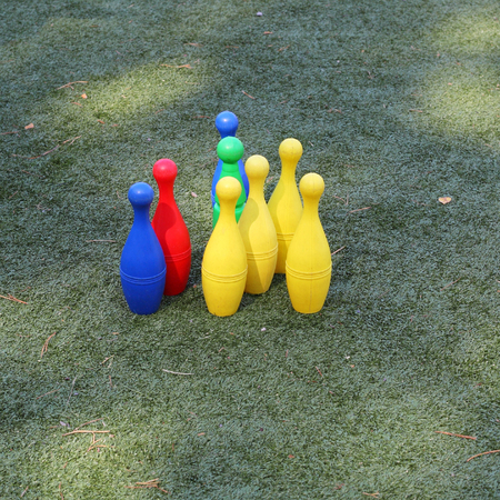 bright color skittles on the grassの写真素材