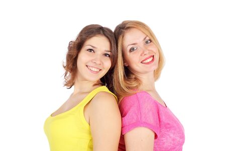 two pretty bright young girlsの写真素材