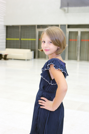 pretty little girl posing in the hallの写真素材