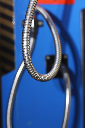 set of the metal hoses on an automatic machineの写真素材