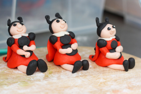 Marzipan tiny figures for a cakeの写真素材