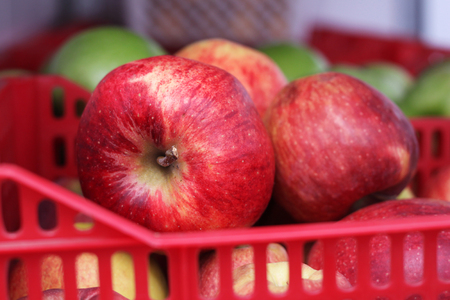 big red apples in a storeの写真素材