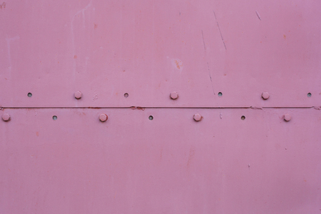 metal rivets on the wallの写真素材