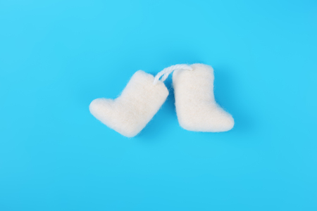 russian souvenir valenki over blue backgroundの写真素材