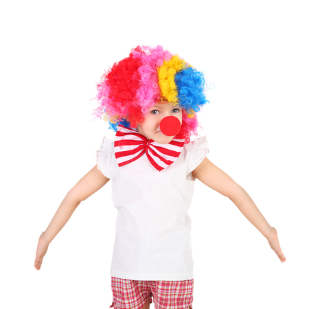 cute little girl dressed as a clownの写真素材