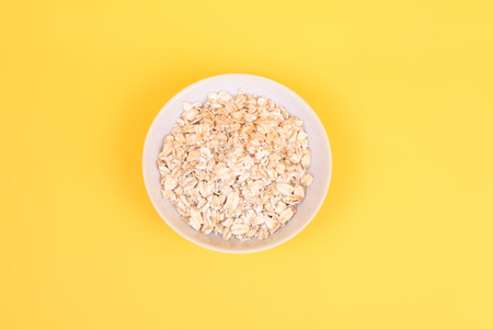 white plate of oats closeup