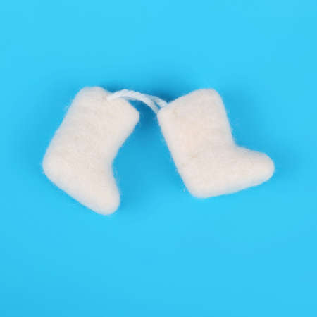 Valenki russian souvenir on light blue backgroundの写真素材