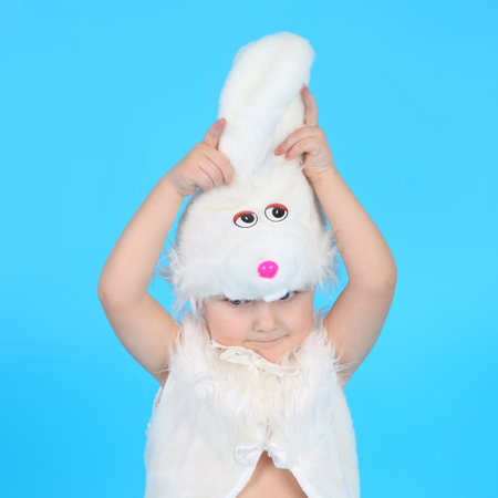 Cute little baby in a bunny costumeの写真素材