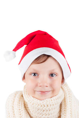 Little boy in a Santa Claus red capの写真素材