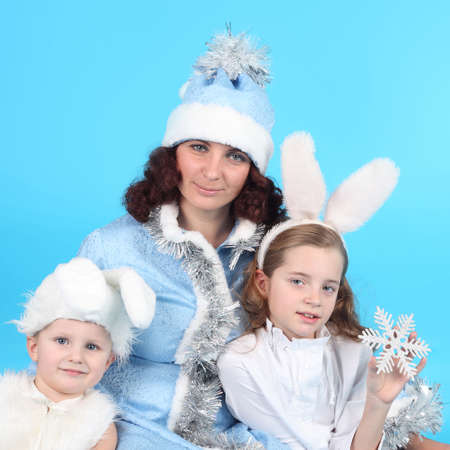 New Year family on the blue backgroundの写真素材