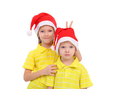 Cute little kids in Santa Claus capsの写真素材