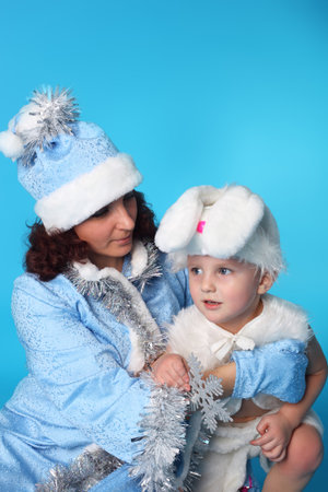 pretty young Snow Maiden with the cute little hareの写真素材