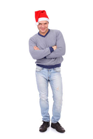 handsome young guy wearing Santa Claus capの写真素材
