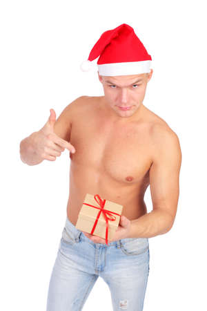 handsome young guy wearing Santa Claus capの写真素材