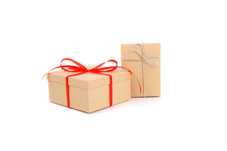 gift boxes with red and silver bowsの写真素材