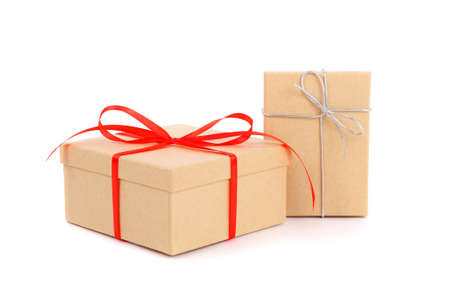 gift boxes with red and silver bowsの写真素材