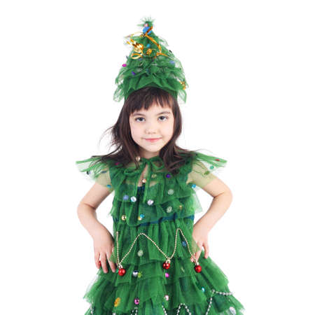 pretty little girl posing in the costume of the newyear treeの写真素材