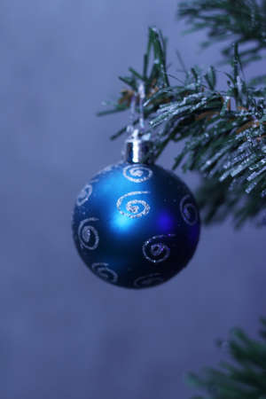 blue bauble hanging on the Christmas treeの写真素材
