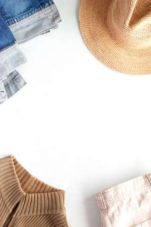 cowboy style clothes background of hat, jeans, jacket, and pullover, top view, copy spaceの写真素材