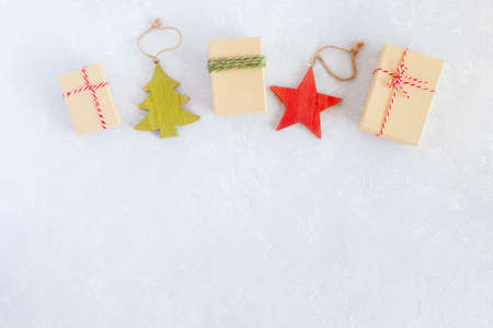 Christmas composition made of gift boxes and wooden decoration, top view, copy spaceの写真素材