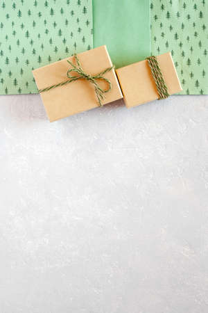 craft paper New Year and Christmas gift boxes and green paper gift bags, copy spaceの写真素材