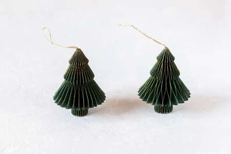 New Year and Christmas paper green and golden decorative trees, zero waste conceptの写真素材