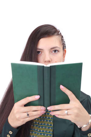 pretty young brunette girl with a bookの写真素材