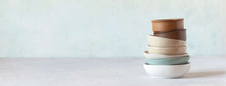 Stack of ceramic bowls of different sizesの写真素材