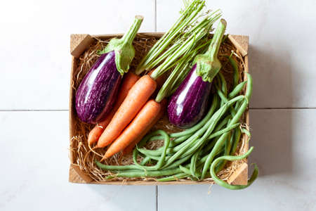 Case of vegetables on the tiles backgroundの写真素材