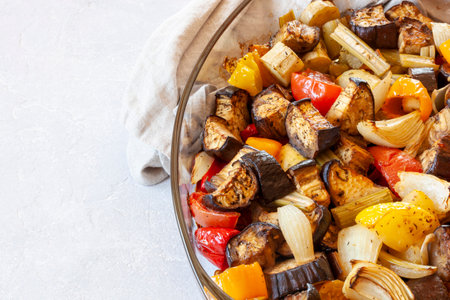 baking dish with baked vegetables closeup, top view, copy spaceの写真素材