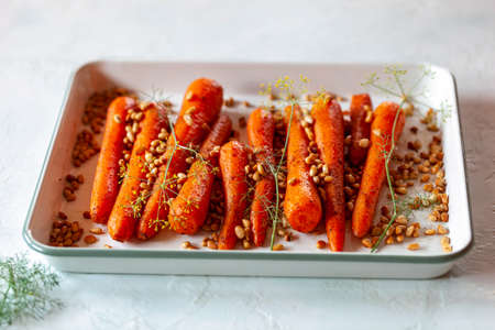 Lebanese-style carrots prepared with pine nuts and cuminの写真素材