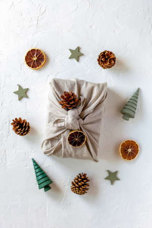 Christmas textile packed gift with the natural materials decoration, zero wasteの写真素材