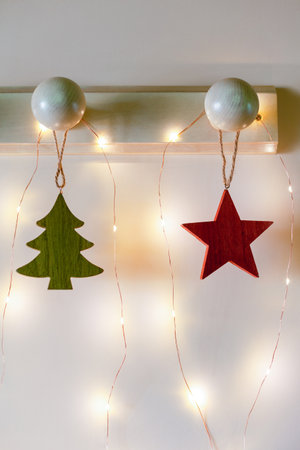 Christmas wooden interior decoration with garland lightsの写真素材