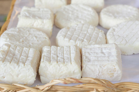 Fresh goat homemade cheese at the marketの写真素材