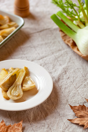 Portion of braised fennel served in a plateの写真素材