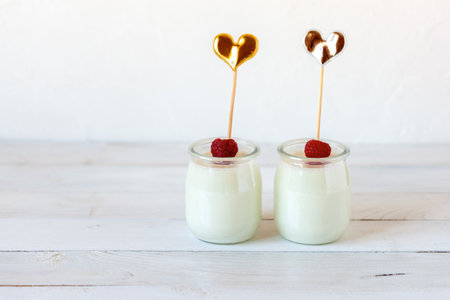 Two portions of homemade yoghurt, idea for Valentines Day breakfastの写真素材