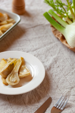Portion of cooked fennel on a tableの写真素材