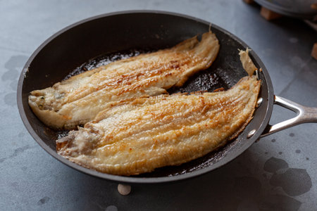 Sole fish prepared on a frying panの写真素材