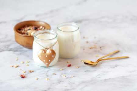 Valentine Day breakfast of yogurt and oat flakesの写真素材