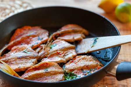 Red mullet fish cooked on a panの写真素材
