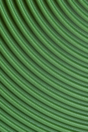 abstract curved different shades of green color backgroundの写真素材
