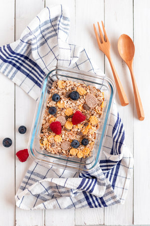 lunchbox of oat flakes with fresh fruits, zero waste, top viewの写真素材