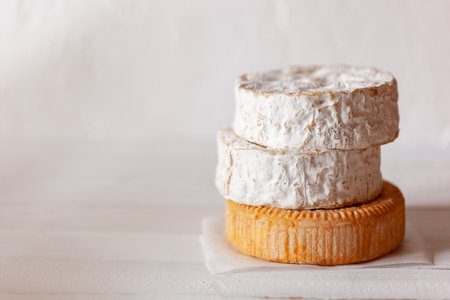 stack of soft french goat cheese camembert styleの写真素材