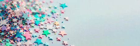 Star shaped confetti on the blue background. Banner with copy space, artificial intelligenceの素材