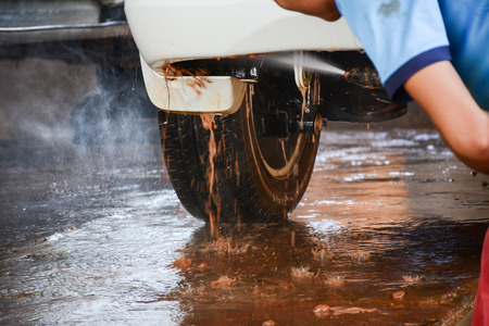 white car to be washed frequently,carcare in laos
