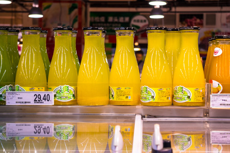 Fruit juice selling on the shelf in a supermarket のeditorial素材
