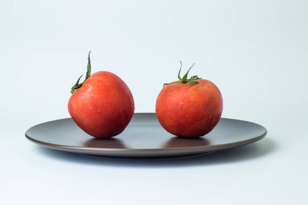 Two tomatoesの写真素材