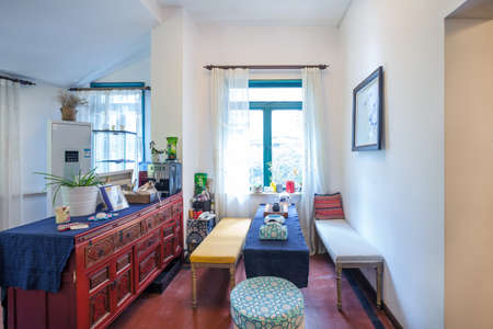 Interior view of a living room with tea table and benchのeditorial素材