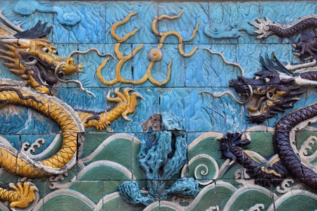 Dragon symbol of the Chinese Empire and its emperor on the Nine dragon wall in Beijingのeditorial素材