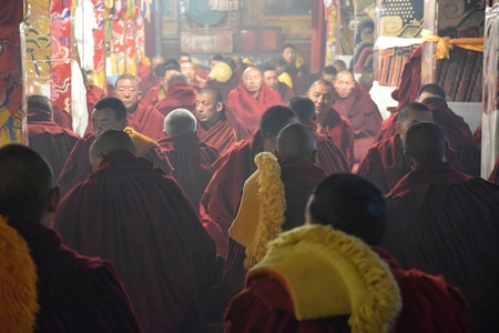 GANDEN, TIBET AUTONOMOUS REGION - CIRCA MAY 2018: Tibetan monks practicing meditation inside Ganden Monastery.のeditorial素材